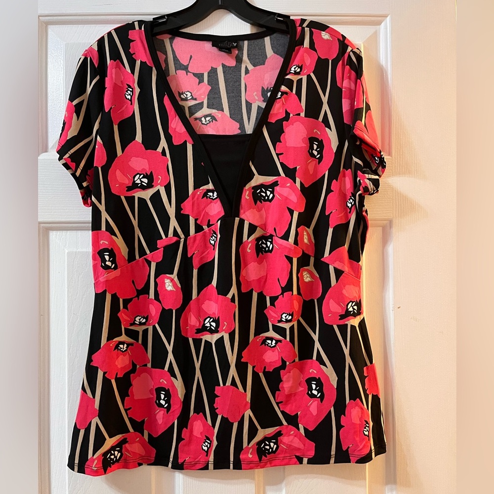 East 5th Black Top with beautiful flowers.
